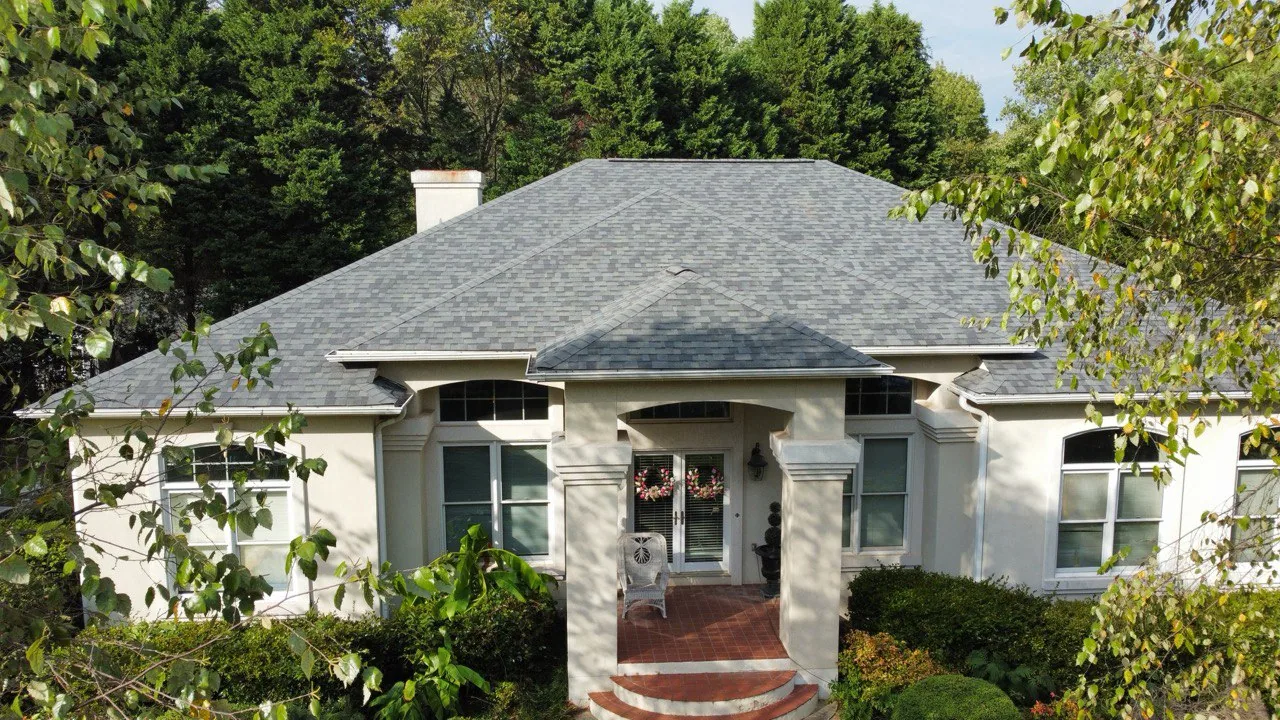 Completed gray shingle roof on a Concord home by Triumph Roofing